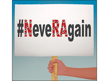 Never Again Sign with protester